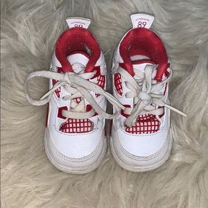 Red and white baby jordans
